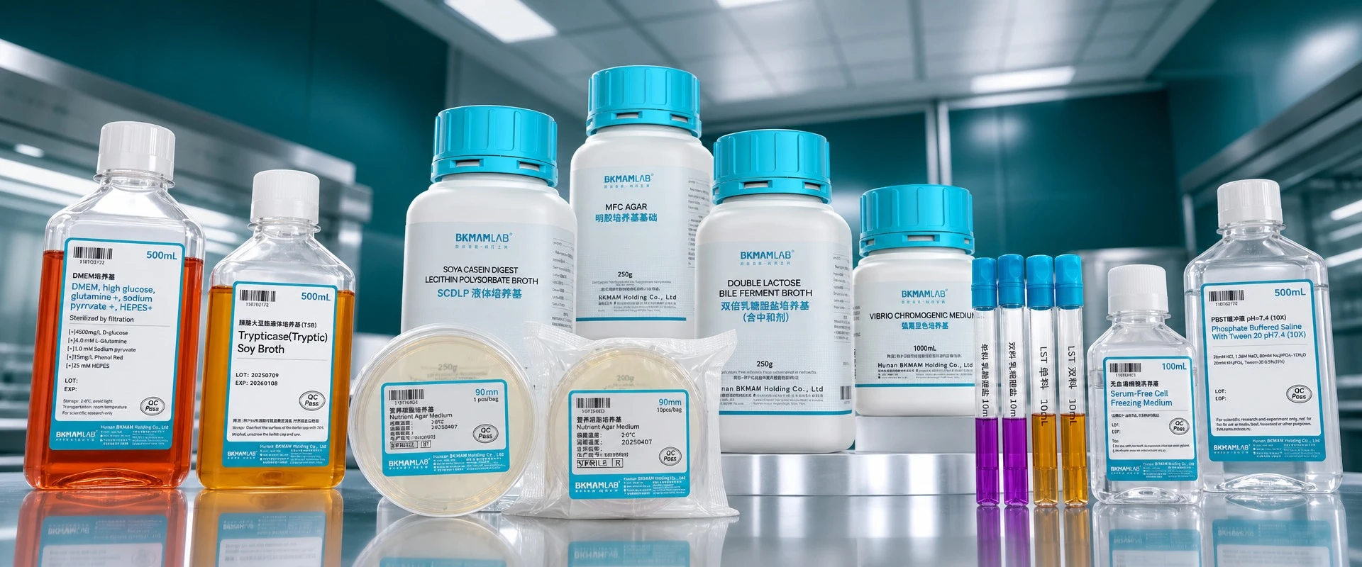 BKMAMLAB laboratory reagents and culture media collection featuring DMEM, Tryptic Soy Broth, agar powder, nutrient agar plates, and PBS buffer on a lab bench.